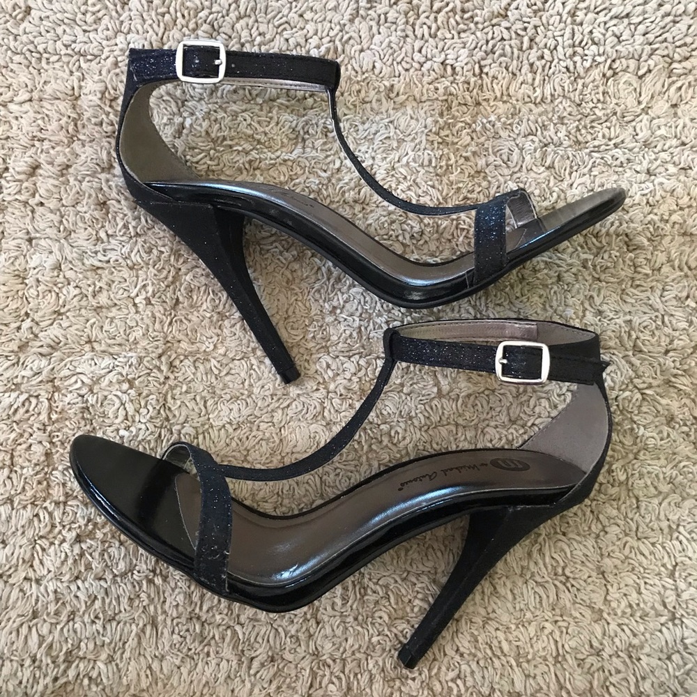 Micheal Antonio Black glitter heels.